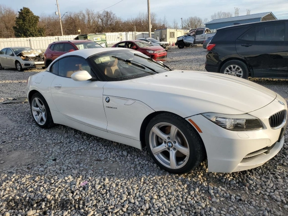 2012 BMW Z4 sDrive28i with VIN WBALL5C59CJ103051, listed as a Copart auction lot 87015834 with 92,071 mi miles and Salvage title. Bid and sale history available at DreamBid. Image 4.