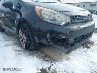 2013 Kia Rio LX with VIN KNADM5A37D6194117, listed as a IAAI auction lot 41522784 with 125,325 mi miles. Bid and sale history available at carsss.com. Image 6.