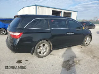 2012 Honda Odyssey Touring with VIN 5FNRL5H9XCB022284, listed as a Copart auction lot 82766824 with Not provided miles and Salvage title. Bid and sale history available at DreamBid. Image 3.