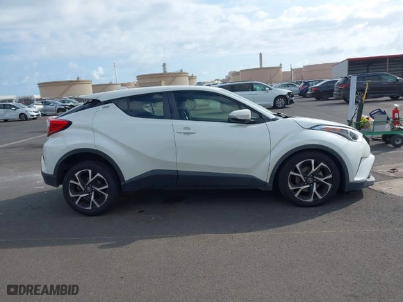 2018 Toyota C-HR XLE with VIN JTNKHMBX7J1007795, listed as a IAAI auction lot 41563164 with 93,307 mi miles. Bid and sale history available at carsss.com. Image 14.
