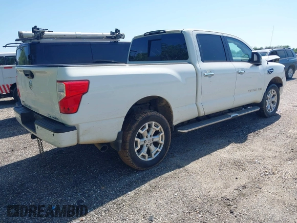 2018 Nissan Titan XD SV with VIN 1N6BA1F46JN526690, listed as a IAAI auction lot 41989215 with 129,626 mi miles. Bid and sale history available at carsss.com. Image 4.