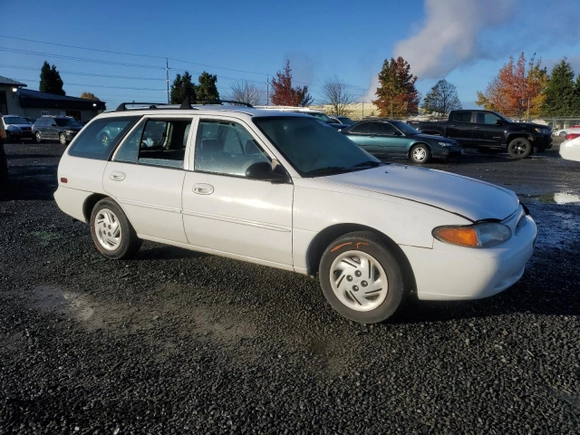 1998 Ford Escort SE with VIN 3FAFP15PXWR242102, listed as a Copart auction lot 77914714 with 164,333 mi miles and Salvage Title. Bid and sale history available at carsss.com. Image 4.