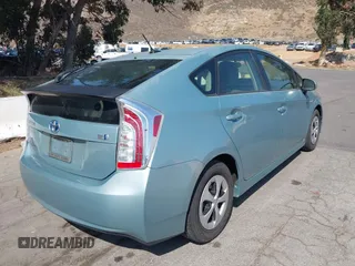2014 Toyota Prius Four with VIN JTDKN3DU2E1765639, listed as a IAAI auction lot 42433480 with 97,083 mi miles and . Bid and sale history available at DreamBid. Image 4.