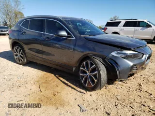 2021 BMW X2 sDrive28i z VIN WBXYH9C04M5S06297, wystawiony jako Copart lot #50768015 z przebiegiem 85 098 mil mil oraz Szkody całkowita. Historia ofert i sprzedaży dostępna na DreamBid. Obrazek 4.