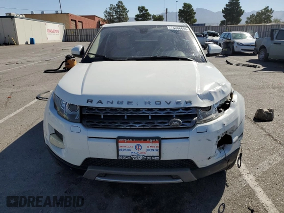 2015 Land Rover Range Rover Evoque Prestige with VIN SALVV2BGXFH958725, listed as a Copart auction lot 74386694 with 121,555 mi miles and Salvage title. Bid and sale history available at DreamBid. Image 5.