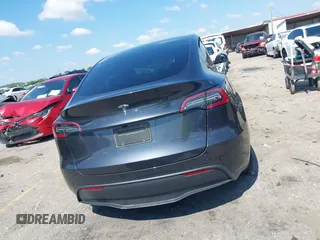 2024 Tesla Model Y with VIN 7SAYGDED9RA321373, listed as a IAAI auction lot 42228491 with 6,452 mi miles and . Bid and sale history available at DreamBid. Image 15.