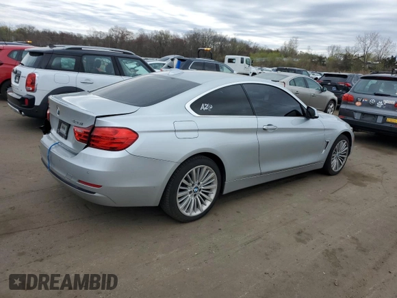 2016 BMW 4 Series 428i xDrive with VIN WBA3N9C56GK249666, listed as a Copart auction lot 53881285 with 140,031 mi miles and Salvage title. Bid and sale history available at DreamBid. Image 3.
