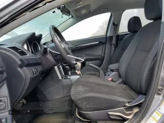2016 Mitsubishi Lancer SE with VIN JA32V2FW0GU003080, listed as a Copart auction lot 71463814 with 151,595 mi miles and Salvage Title. Bid and sale history available at DreamBid. Image 7.