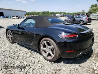 2017 Porsche 718 Boxster z VIN WP0CA2A85HS221846, wystawiony jako Copart lot #55542923 z przebiegiem 32 293 mil mil oraz . Historia ofert i sprzedaży dostępna na DreamBid. Obrazek 2.