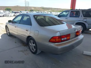 1999 Lexus ES 300 Luxury Sport Sdn with VIN JT8BF28G0X5065317, listed as a IAAI auction lot 42080216 with 163,223 mi miles. Bid and sale history available at carsss.com. Image 3.