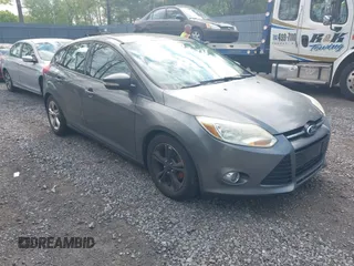 2012 Ford Focus SE with VIN 1FAHP3K28CL322912, listed as a IAAI auction lot 42217297 with 174,444 mi miles and . Bid and sale history available at carsss.com. Image 1.