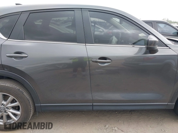 2023 Mazda CX-5 S Carbon Edition z VIN JM3KFBCM7P0226930, wystawiony jako IAAI lot #41939956 z przebiegiem 29 477 mil mil oraz . Historia ofert i sprzedaży dostępna na DreamBid. Obrazek 13.