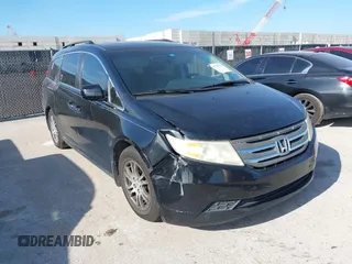 2012 Honda Odyssey EX-L with VIN 5FNRL5H63CB046447, listed as a IAAI auction lot 42578775 with 247,852 mi miles and . Bid and sale history available at DreamBid. Image 1.