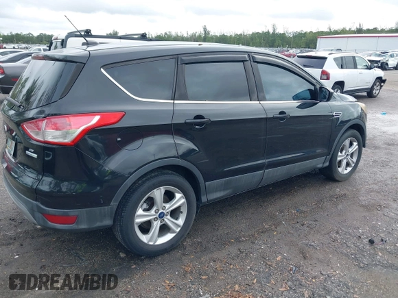 2014 Ford Escape SE z VIN 1FMCU0GX3EUC38084, wystawiony jako IAAI lot #38231507 z przebiegiem 157 955 mil mil oraz . Historia ofert i sprzedaży dostępna na DreamBid. Obrazek 4.