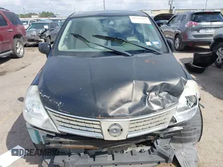 2009 Nissan Versa 1.8 S with VIN 3N1BC11E09L450167, listed as a IAAI auction lot 41711284 with 91,216 mi miles. Bid and sale history available at carsss.com. Image 12.