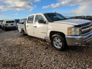 2012 Chevrolet Silverado 1500 LT with VIN 3GCPKSE75CG100265, listed as a Copart auction lot 83120224 with 143,807 mi miles and Salvage Title. Bid and sale history available at carsss.com. Image 13.