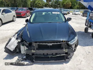 2016 Ford Fusion SE with VIN 3FA6P0HD2GR394517, listed as a Copart auction lot 63701495 with 122,976 mi miles and Salvage title. Bid and sale history available at DreamBid. Image 5.
