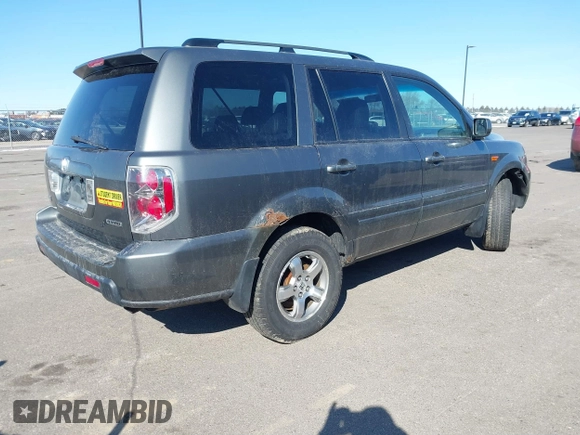 2007 Honda Pilot EX-L with VIN 2HKYF18667H501911, listed as a IAAI auction lot 41752356 with 267,277 mi miles and . Bid and sale history available at DreamBid. Image 4.