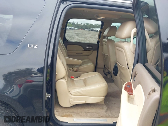 2010 Chevrolet Suburban LTZ with VIN 1GNUCKE02AR220449, listed as a IAAI auction lot 41665749 with 264,447 mi miles and . Bid and sale history available at DreamBid. Image 8.