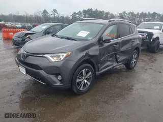 2018 Toyota RAV4 XLE with VIN 2T3RFREV5JW798328, listed as a IAAI auction lot 41868104 with 61,076 mi miles. Bid and sale history available at carsss.com. Image 17.