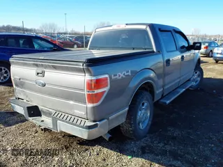 2014 Ford F-150 XL with VIN 1FTFW1EF7EKD93048, listed as a IAAI auction lot 41443576 with 167,124 mi miles. Bid and sale history available at carsss.com. Image 4.
