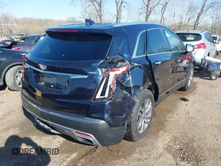 2021 Cadillac XT5 FWD Premium Luxury z VIN 1GYKNCRS2MZ141440, wystawiony jako IAAI lot #41874409 z przebiegiem 76 911 mil mil oraz . Historia ofert i sprzedaży dostępna na DreamBid. Obrazek 6.