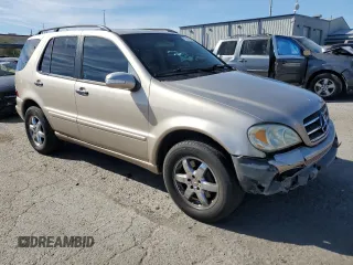 2004 Mercedes-Benz M-Class 5.0L with VIN 4JGAB75E64A488281, listed as a Copart auction lot 77031744 with 128,699 mi miles and Salvage Title. Bid and sale history available at carsss.com. Image 4.