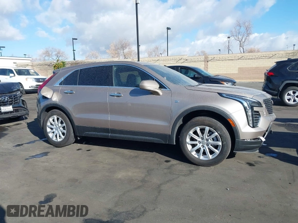 2023 Cadillac XT4 FWD Luxury z VIN 1GYAZAR40PF135132, wystawiony jako IAAI lot #41684609 z przebiegiem 12 164 mil mil oraz . Historia ofert i sprzedaży dostępna na DreamBid. Obrazek 14.