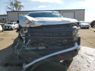 2022 Chevrolet Silverado 1500 Custom Trail Boss with VIN 3GCPDCED1NG620908, listed as a Copart auction lot 74954494 with 76,529 mi miles and Salvage Title. Bid and sale history available at DreamBid. Image 5.