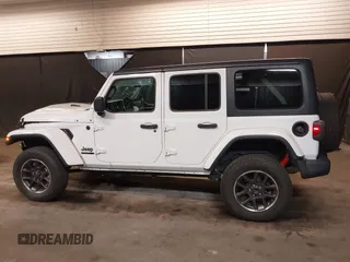 2021 Jeep Wrangler Unlimited Freedom with VIN 1C4HJXDNXMW681267, listed as a IAAI auction lot 42026181 with 40,143 mi miles and . Bid and sale history available at DreamBid. Image 14.
