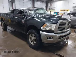 2011 Ram 2500 Laramie Longhorn with VIN 3D7UT2HL7BG594707, listed as a IAAI auction lot 41929245 with 317,062 mi miles and . Bid and sale history available at DreamBid. Image 1.