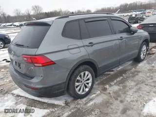2018 Volkswagen Tiguan S with VIN 3VV0B7AX1JM143571, listed as a IAAI auction lot 41555436 with 72,545 mi miles. Bid and sale history available at carsss.com. Image 4.