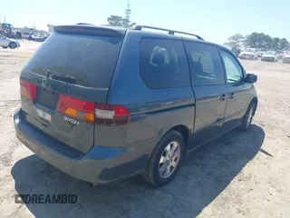 2003 Honda Odyssey EX with VIN 5FNRL18683B132703, listed as a IAAI auction lot 42004982 with Not Provided miles and . Bid and sale history available at DreamBid. Image 4.