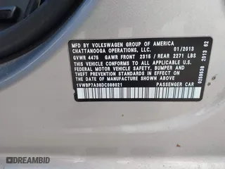 2013 Volkswagen Passat SE with VIN 1VWBP7A38DC086021, listed as a IAAI auction lot 41912361 with 215,843 mi miles. Bid and sale history available at carsss.com. Image 9.