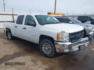 2013 Chevrolet Silverado 1500 LT with VIN 3GCPCSE02DG314650, listed as a IAAI auction lot 41266228 with 213,634 mi miles. Bid and sale history available at carsss.com. Image 1.