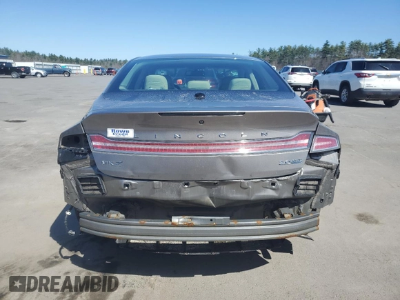 2015 Lincoln MKZ with VIN 3LN6L2J97FR625090, listed as a Copart auction lot 54340285 with 121,154 mi miles and Salvage title. Bid and sale history available at DreamBid. Image 6.