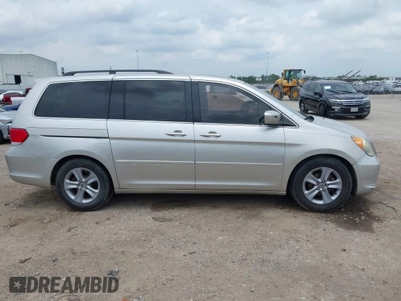 2009 Honda Odyssey Touring z VIN 5FNRL38979B052923, wystawiony jako IAAI lot #42427207 z przebiegiem 201 483 mil mil oraz . Historia ofert i sprzedaży dostępna na DreamBid. Obrazek 13.