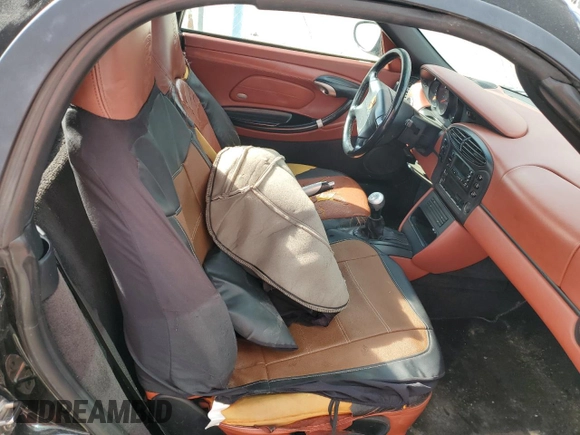2000 Porsche Boxster z VIN WP0CA2988YU627807, wystawiony jako Copart lot #45522955 z przebiegiem 120 384 mil mil oraz Szkody całkowita. Historia ofert i sprzedaży dostępna na DreamBid. Obrazek 10.