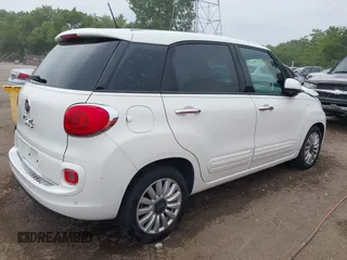 2014 FIAT 500L Easy with VIN ZFBCFABH8EZ002444, listed as a IAAI auction lot 42471881 with 134,266 mi miles and . Bid and sale history available at DreamBid. Image 4.