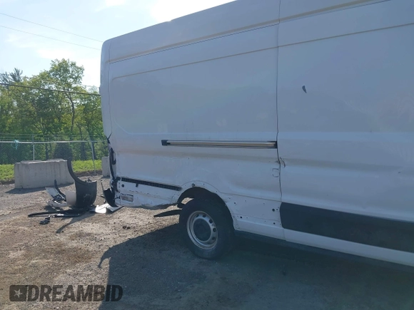 2021 Ford Transit Cargo z VIN 1FTBW3X84MKA60720, wystawiony jako IAAI lot #42202665 z przebiegiem 67 295 mil mil oraz . Historia ofert i sprzedaży dostępna na DreamBid. Obrazek 18.