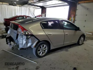 2010 Honda Insight EX with VIN JHMZE2H76AS021610, listed as a Copart auction lot 62992225 with 162,974 mi miles and Salvage title. Bid and sale history available at DreamBid. Image 3.