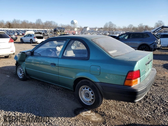 1996 Toyota Tercel DX z VIN JT2AC52L6T0170537, wystawiony jako Copart lot #42576525 z przebiegiem 66 926 mil mil oraz Szkoda całkowita • Salvage title. Historia ofert i sprzedaży dostępna na DreamBid. Obrazek 2.
