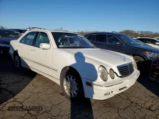 2002 Mercedes-Benz E-Class with VIN WDBJF82JX2X072551, listed as a Copart auction lot 83607634 with 139,645 mi miles and Salvage Title. Bid and sale history available at carsss.com. Image 4.
