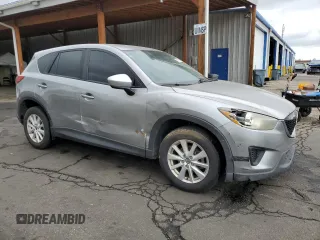2013 Mazda CX-5 Sport z VIN JM3KE4BE4D0147672, wystawiony jako Copart lot #61617215 z przebiegiem 264 421 mil mil oraz Czysty tytuł • Clean title. Historia ofert i sprzedaży dostępna na DreamBid. Obrazek 4.