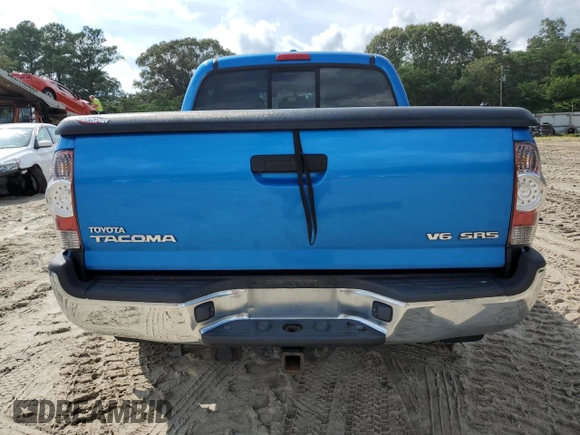 2009 Toyota Tacoma with VIN 3TMLU42N39M021727, listed as a Copart auction lot 65031095 with 200,386 mi miles and Salvage title. Bid and sale history available at DreamBid. Image 6.