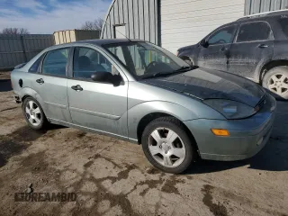 2003 Ford Focus ZTS with VIN 1FAFP38393W115936, listed as a Copart auction lot 42598715 with 100,610 mi miles and Salvage Title. Bid and sale history available at carsss.com. Image 4.