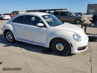 2012 Volkswagen Beetle 2.5L with VIN 3VWJX7AT0CM659261, listed as a Copart auction lot 79513824 with 144,537 mi miles and Salvage Title. Bid and sale history available at carsss.com. Image 4.