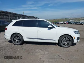 2019 Audi Q7 Prestige z VIN WA1VAAF77KD042653, wystawiony jako IAAI lot #42094332 z przebiegiem 73 489 mil mil oraz . Historia ofert i sprzedaży dostępna na DreamBid. Obrazek 13.