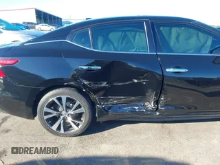 2016 Nissan Maxima SV with VIN 1N4AA6AP0GC385090, listed as a IAAI auction lot 41215857 with 97,072 mi miles and . Bid and sale history available at DreamBid. Image 6.