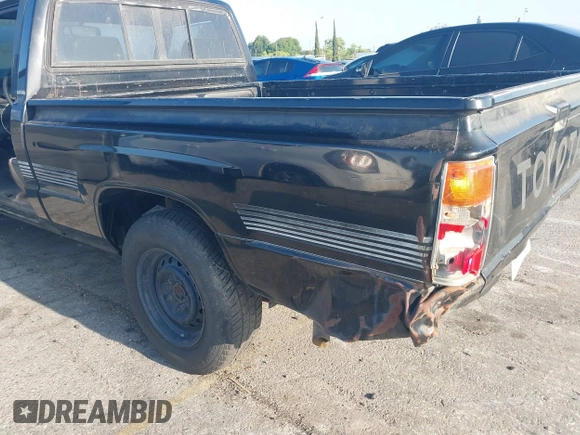1987 Toyota Pickup with VIN JT4RN50R8H0277401, listed as a IAAI auction lot 42148719 with 239,923 mi miles and . Bid and sale history available at DreamBid. Image 6.